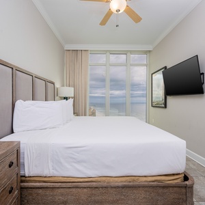 Relax on the cozy king bed in this guest suite and stream your favorite shows after a beach day