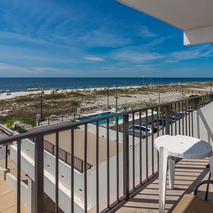 Enjoy breathtaking beachfront views from the balcony, perfect for relaxing or dining outdoors