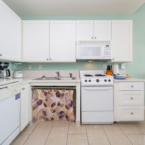 Prepare meals in this wheelchair accessible kitchen with lower countertops and appliances for ease and comfort