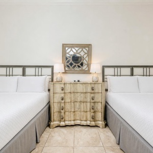 Experience restful nights in this queen suite, where plush bedding awaits and thoughtful decor enhances relaxation