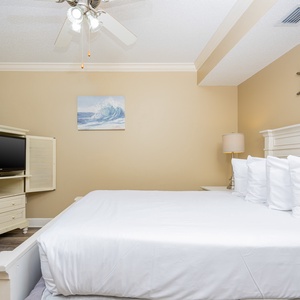 Relax on the cozy queen bed in this guest suite and stream your favorite shows after a fun vacation day