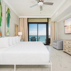 Relax in the master bedroom featuring a king bed and the sights and sounds of the gulf coast