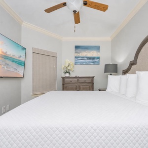 Unwind and watch shows after a fun day at the beach in this king guest suite