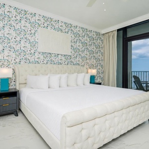 Rest peacefully on the plush king bed with the sights and sounds of the coast