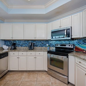 Create your favorite meals in this charming kitchen, surrounded by vibrant decor that enhances your beach experience
