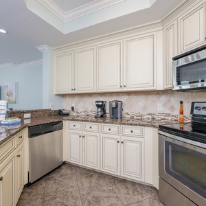 Kitchen featuring stainless appliances, granite countertops, and stylish cabinetry for a delightful cooking experience