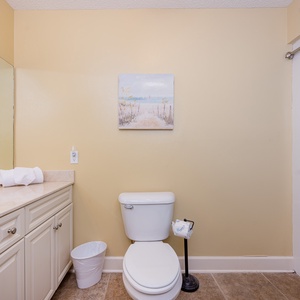Pamper yourself with a refreshing morning in this guest bath and get ready for a day at the beach
