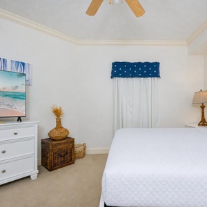 Relax on the cozy queen bed in this guest suite and stream your favorite shows after a fun vacation day