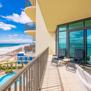 Enjoy the coastal vibe from your balcony, sipping drinks as you take in the panoramic views of the beach below