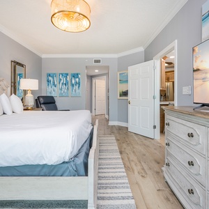 Relax in the king master suite, enjoying tranquil moments and refreshing breezes that enhance your getaway