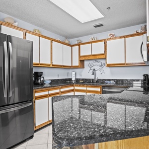 Whip up family favorites in the inviting kitchen, where ample space and charm inspire culinary adventures together