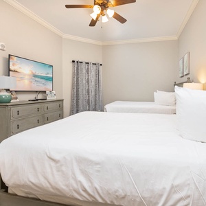 Drift into peaceful dreams in queen beds, where serene decor enhances your restful retreat by the coast