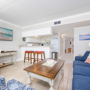Unwind on the plush sofa with a queen sleeper, streaming your favorite shows while enjoying the inviting beach vibe