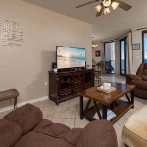 Relax in the comfortable seating including a sofa with queen sleeper while enjoying beachfront views