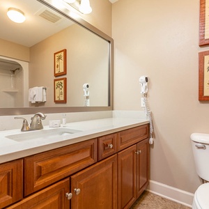 Refresh yourself in this guest bathroom, enjoying the serene vibe and relaxing shower on your retreat