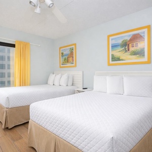 Drift into restful sleep in the guest suite, surrounded by cheerful decor that brightens the vibe of your cozy retreat