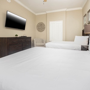 Unwind in this queen guest suite and stream your favorite shows or enjoy a good movie after a beach day