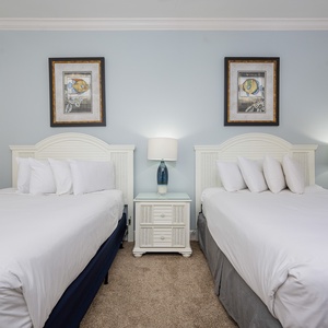 Rest on one of the cozy queen beds in this guest suite and enjoy a peaceful slumber