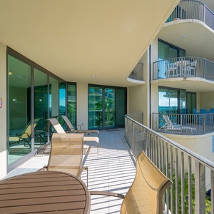 Relax on your spacious balcony, enjoying sounds and vibrant views while lounging with loved ones