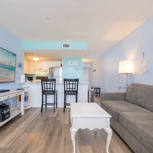 Unwind after a day at the beach in this inviting living space for movie night and relax