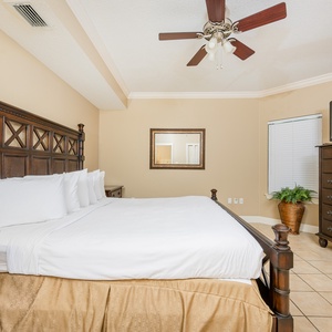 Relax on the cozy king bed in this guest suite and stream your favorite shows after a fun vacation day