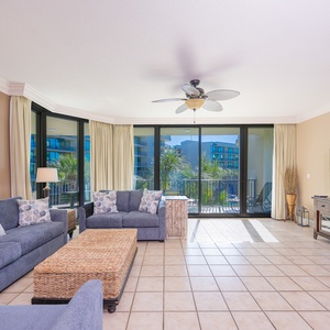 Unwind on the plush seating, featuring a queen sofa sleeper, and enjoy the coastal vibe