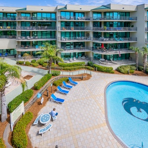 Discover the pool area with a refreshing lazy river and thrilling waterslide, just steps from the bay
