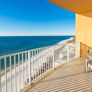 Relax in balcony chairs, listening to waves and watching the gulf and shore stretch into the distance