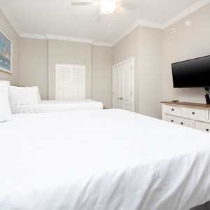 Unwind in this queen guest suite and stream your favorite shows or enjoy a good movie after a beach day