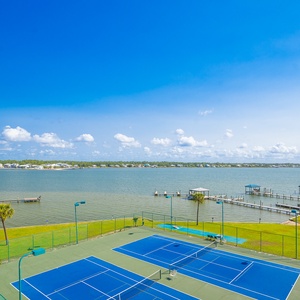 Take in the refreshing views of the lagoon and enjoy a game of tennis right from your balcony