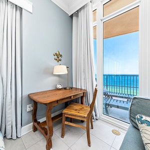 Settle at the wooden desk and gaze at the gulf's blue water to catch up on emails or plan your next adventure