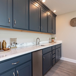 Mix refreshing drinks at the sleek wet bar, and enjoy the vibrant atmosphere while unwinding after a day at the beach