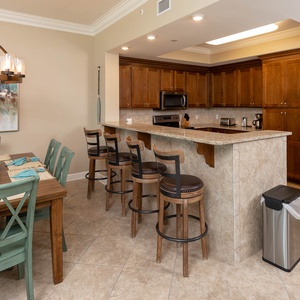 Wake up with morning coffee at the breakfast bar and get ready for a beach day in this stylish space