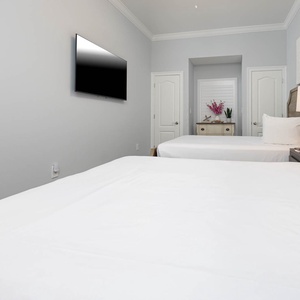 Curl up in this queen guest suite and cast a favorite show to the TV while resting on fluffy pillows