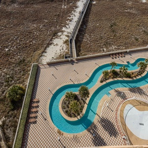 Discover the refreshing pool area with gradual entry, indoor hot tubs and pool, a winding lazy river and thrilling waterslide