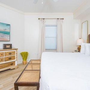 Relax on the cozy king bed in this guest suite and stream your favorite shows after a fun vacation day