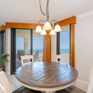 Savor fresh coffee at your round dining table while catching stunning beach views through expansive windows