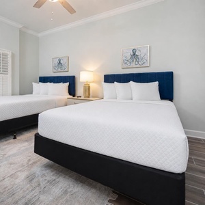 Drift into soft bedding on either queen bed in this guest suite, switch on the lamp, and relax with a good book