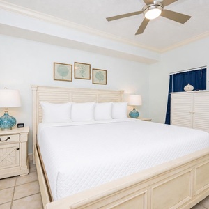 Retreat to the king master suite with cozy bedding and drift off to the coastal sights and sounds