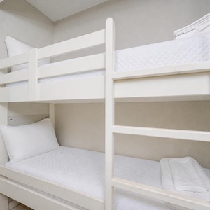 Cozy bunk area in the hallway for kids to enjoy relaxing after a day of adventure