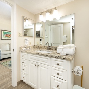 Soft light glows above your bathroom sink as you refresh and ready yourself for beachside adventures