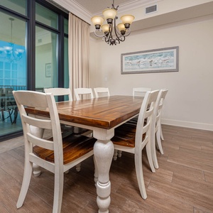 Gather around the dining table to share laughter and stories, while enjoying stunning beach views