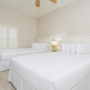 Nightfall settles quietly as you sink into the fluffy linens of this guest suite's queen beds