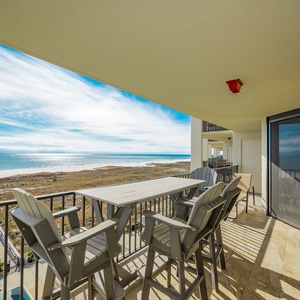 Relax on your balcony, sipping a drink while soaking in the striking views of the coast and vibrant skies