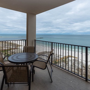Savor your morning coffee on the balcony, with views of the tranquil waters and gentle waves below