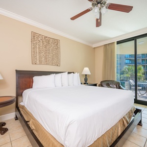 Retreat to the king master suite with cozy bedding and drift off to coastal sights and sounds of the bay