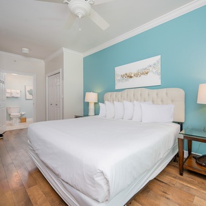 Drift off into restful slumber in the master suite, embraced by a calming ambiance and soft coastal colors
