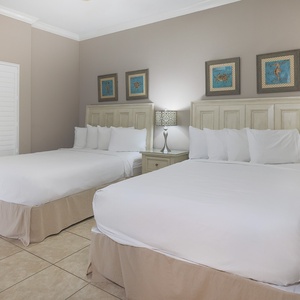 Relax on one of the cozy queen beds in this guest suite and enjoy a peaceful slumber