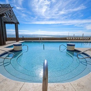 Take a dip in the outdoor pool to cool off, perfect for unwinding and soaking up the serene atmosphere in Orange Beach