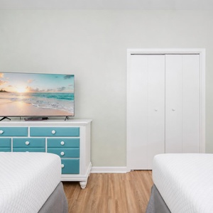 Enjoy relaxing evenings with streaming shows on the flat screen TV in this queen guest suite